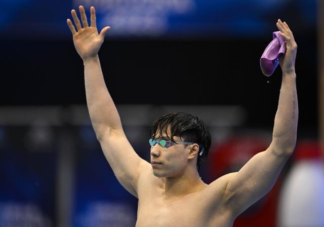 开云-世锦赛Day4：覃海洋问鼎50蛙 男女4X100混中国摘金